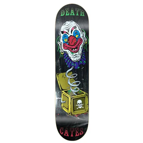 Death Skateboards Death Benson Devil Woman skateboard deck: Menacing clown head with a ruffled collar springing from a yellow jack-in-the-box marked with a skull and crossbones, on a black deck, with Death and Cates in lettering at either end.