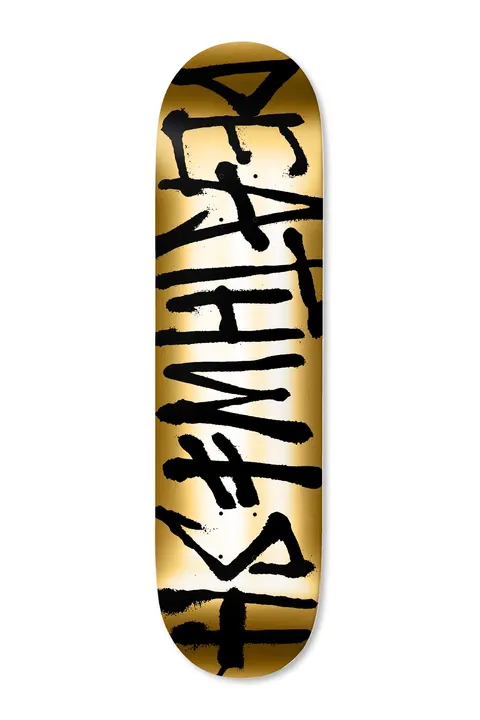 Deathwish El Dorado Spray 8.25 (gold) skateboard deck: Deathwish logo in rough black spray-paint style lettering running the length of the deck, on a reflective gold foil background.
