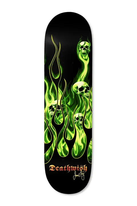 Deathwish Foy Ammonia Burn 8.3875 skateboard deck: Green flames with skulls rising out of them on a black deck, in a custom-paint style with yellow pinstriped edges; 'Deathwish' in red-orange gothic lettering and a signature at the tail.