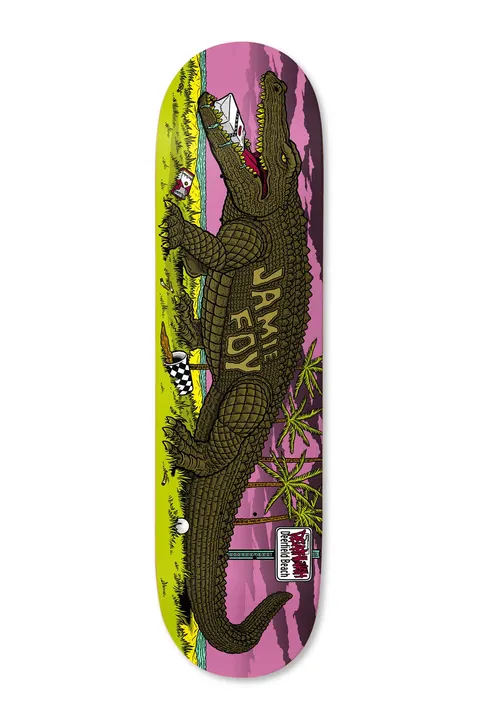 Deathwish Foy Deerfield Mascot 8.25 skateboard deck: Illustration of a large crocodile holding a pizza box in its jaws, on grass beside the sea with palm trees, a chequered flag and a drink cup, under a pink sky. The rider name is on its back and a Deerfield Beach sign at the bottom.