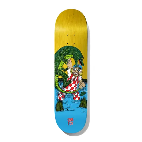 Deathwish Foy Gator Attack 8.25 skateboard deck: Cartoon of a wide-eyed man in a red-checked overalls and blue cap being attacked by a large green alligator while standing in a swamp with reeds. Yellow-stained top and blue water at the tail, rider name in red.
