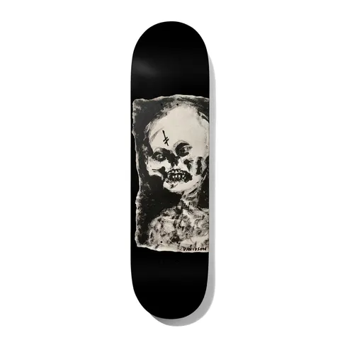 Deathwish Julian Expired 8.38 skateboard deck: Rough, painterly black-and-cream portrait of a ghoulish skull-faced figure with an inverted cross on the forehead, set in a ragged-edged panel on a black deck. Artist-style surname signed at the lower right.