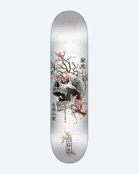 DGK Ancestry White skateboard deck: Illustrated white skull with gold teeth and cherry blossom branches growing from it, with Japanese characters beside it, on a white patterned deck. DGK logo in a box at the bottom.