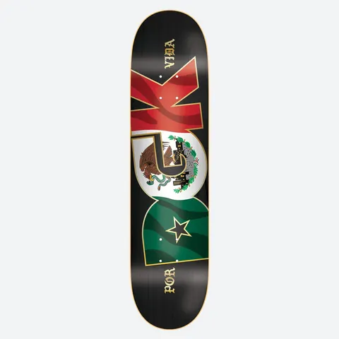 DGK Bandera 8.5 skateboard deck: Large DGK letters filled with the Mexican flag: a red K, a white G with the eagle and snake emblem, and a green D with a star. Gold gothic Por Vida text sits on a black deck.