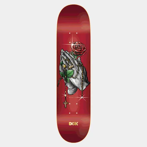 DGK Blessed Lenticular skateboard deck: Grey praying hands wrapped in a gold rosary with a cross, holding a red rose, with sparkle highlights on a red gradient deck. Small 'Blessed' text and a gold brand logo at the tail.