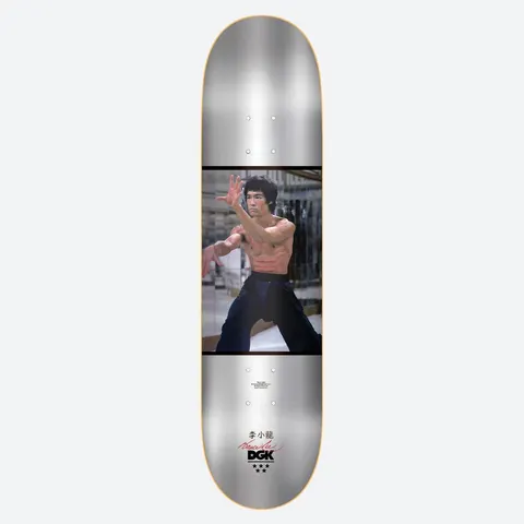 DGK x Bruce Lee Like Echo skateboard deck: Colour photograph of a shirtless martial artist in a fighting stance in a mirrored room, set in a band across a brushed silver deck. Chinese characters, a red signature and the DGK logo with three stars below.