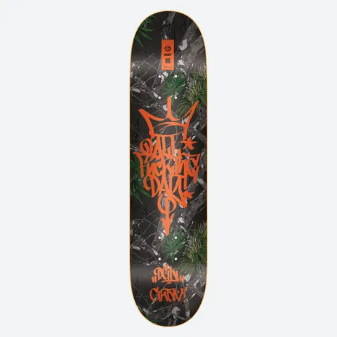 DGK x Grav Survival 8.25 skateboard deck: Orange graffiti tag with a crown reading All Fucking Day over a dark camouflage-style foliage background with green plants. Small orange label at the nose and tag text near the tail.