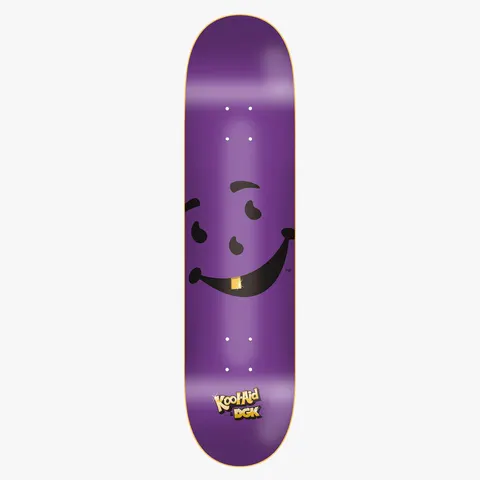 DGK x Kool - Aid Thirst skateboard deck: Large black smiling Kool-Aid Man face with a gold tooth across a purple deck, with a Kool-Aid and DGK logo lockup at the tail.