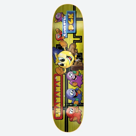 DGK Game Over Shanahan 8.25 skateboard deck: Arcade-game parody in the style of Pac-Man: a smiling yellow ball in a hat and boots is chased by cartoon ghosts through a dotted maze, on a yellow-green wood-effect background with neon logo panels.