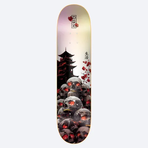 DGK Haunt 8.38 skateboard deck: A pile of grey skulls with glowing red eyes and gold teeth below a dark pagoda and red blossom branch, on a pearly pink and yellow sheen. Boxed DGK logo with flowers at the top and Japanese characters at the side.