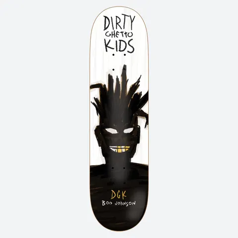 DGK Krazy Boo 8.25 skateboard deck: Painterly black figure with spiky dreadlock-style hair, white eyes and a gold-toothed grin, rising from a black base on a white deck. Hand-lettered brand name across the top and rider name in the lower part.
