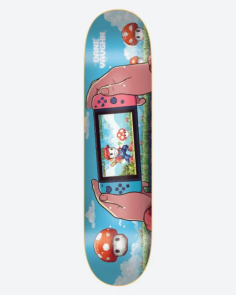DGK One Player Dane 8.0 skateboard deck: Two hands holding a handheld games console showing a pixel-art character, with pixel mushrooms and clouds on a blue sky and grass background. Rider name in pixel lettering at the top.