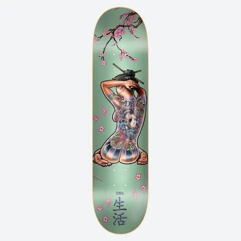 DGK Serenity Foil 8.25 skateboard deck: Seated woman seen from behind with a full-back Japanese tattoo of a geisha, chopsticks in her hair, beneath cherry blossom branches on a metallic mint green deck. Japanese characters at the bottom.