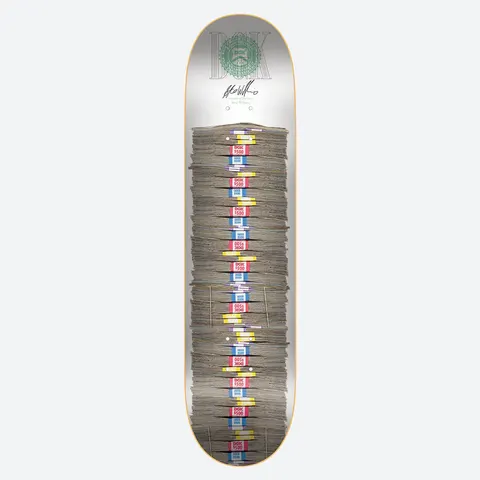 DGK Stacked Up Stevie 8.38 skateboard deck: A photographic tall stack of banknote bundles runs down the middle of a silver-white deck, each bundle wrapped in a coloured band printed DGK $500. A green DGK seal and a signature sit near the nose.