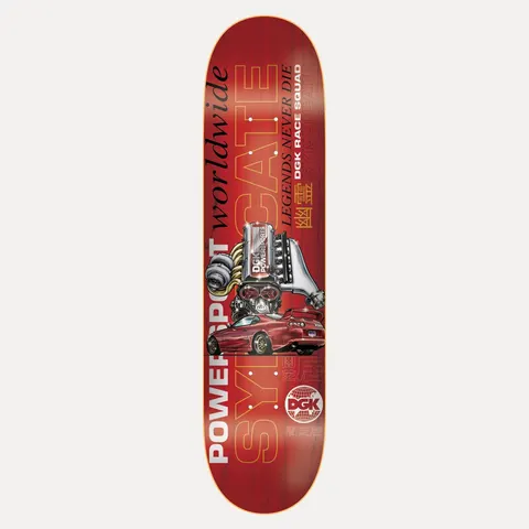 DGK Syndicate 8.38 skateboard deck: Red Toyota Supra-style sports car beneath a chrome turbocharged engine with DGK Powersports branding, over large overlaid Syndicate lettering and Japanese characters. Slogans and a DGK globe logo on a red deck.