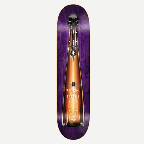 DGK Top Shelf Ortiz 8.1 skateboard deck: Purple stained wood deck with a realistic illustration of a tall amber spirits bottle with a black stopper, labelled with the rider's name and 1994.