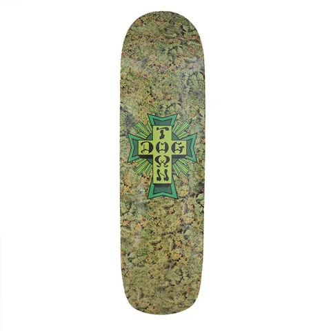 Dogtown 420 Cross Pool - x skateboard deck: Green Dogtown cross logo with rays in the centre of a pool-shaped deck, set over a close-up photographic texture of cannabis buds.