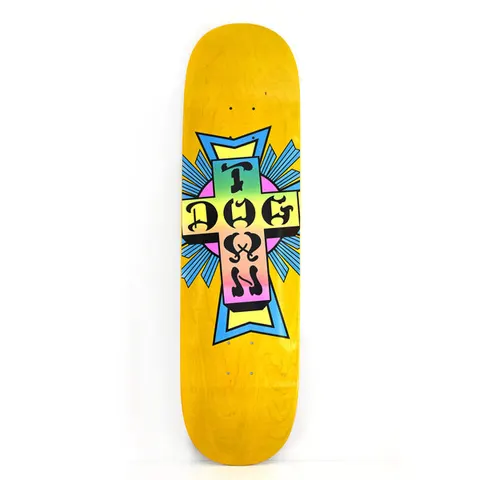 Dogtown Neon Cross Street skateboard deck: Dogtown cross logo with black gothic lettering on a pastel gradient from yellow through green to pink, over a pink circle and blue rays, on a yellow-stained deck.