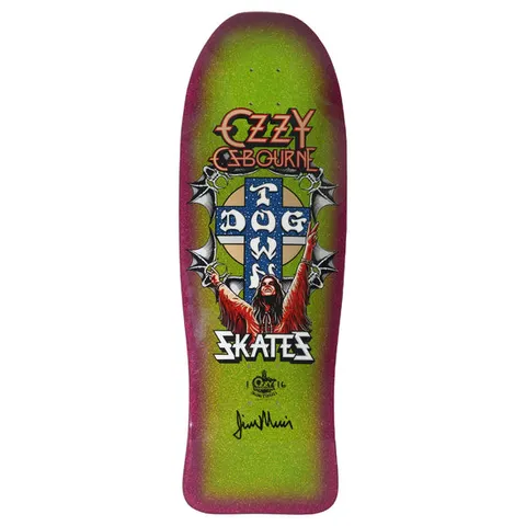 Dogtown Limited Dogtown Ozzy Osbourne - x - Gecko Green / Lavender Flake skateboard deck: Old-school shaped deck with a heavy-metal-style portrait of a long-haired figure with arms raised in front of the Dogtown cross, flanked by bat wings and chains. Ozzy Osbourne logo above, Skates below, with a signature at the bottom.