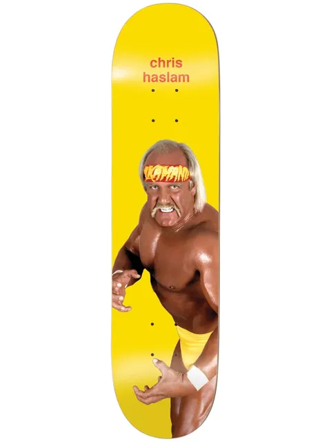 Enjoi Haslam Round 3 R7 8.0 & 8.5 skateboard deck: Photograph of a muscular blond wrestler with a horseshoe moustache and a printed bandana, posed in yellow trunks, on a plain yellow deck. Rider name in small orange lower-case type at the top.