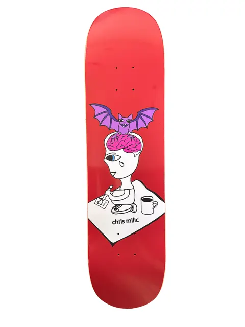 Frog Bat Brain (Chris Milic) skateboard deck: A cartoon one-eyed crying figure with an exposed pink brain, topped by a purple bat, writes on a paper beside a coffee mug and pills, on a red deck with the rider name below.