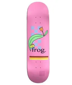 Frog Flower 8.5 skateboard deck: A small green frog peeking out from beneath a large green leaf, with an orange tulip, over blue checks on a pink deck. Black lowercase Frog text and a brown, red and yellow stripe sit below.