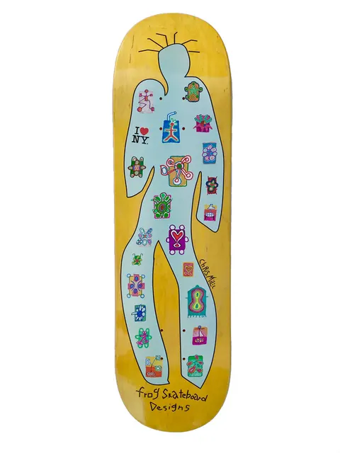 Frog Designs (chris milic) 8.6 skateboard deck: A pale blue human silhouette with spiky rays around the head on a yellow wood deck, filled with small colourful doodle icons, an I Love NY logo on the chest and handwritten artist and brand names.