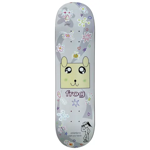 Frog Germs! 8.25 skateboard deck: A cute cartoon animal face in a yellow square, surrounded by doodled germs, stars and hearts, with a small drawn figure at the bottom, on a pale grey deck. Frog logo in purple outline.