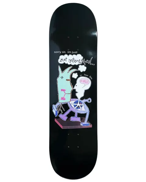 Frog Not Interested (Pat G) 8.38 skateboard deck: Black deck with a hand-drawn cartoon of a pale green hat-like figure walking beside a white-headed character on a wheel, speech bubble reading not interested. Small texts sex, fortune, fame and frog skateboards.