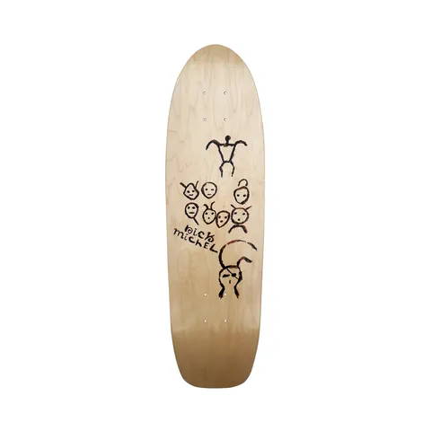 Frog Petroglyphs (Nick Michel) skateboard deck: Natural wood old-school shaped deck with rough black and brown petroglyph-style drawings of a stick figure, a group of small faces and a curled creature with a face. 'Nick Michel' is handwritten in the middle.