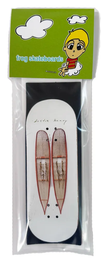 Frog Uncle (Dustin Henry) Fingerboard - 34 MM skateboard deck: Fingerboard in packaging, white deck with two hand-drawn red-framed snowshoes and handwritten 'dustin henry' at the nose. Card header shows a cartoon boy and Frog Skateboards in green.