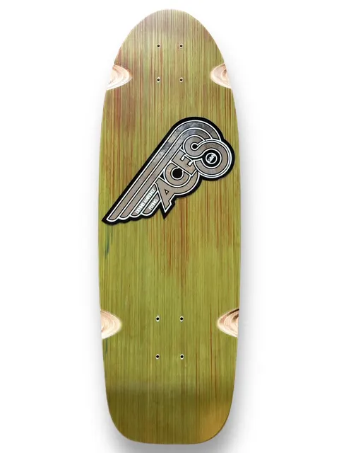 G&S Fibreflex Dennis Martinezs Flying Aces - Red/ Green Multi skateboard deck: Old-school shaped deck in a green-stained wood with red streaks, carrying a silver and grey winged Aces logo set on a diagonal with a black outline. Exposed wood wheel-well cut-outs show at the corners.