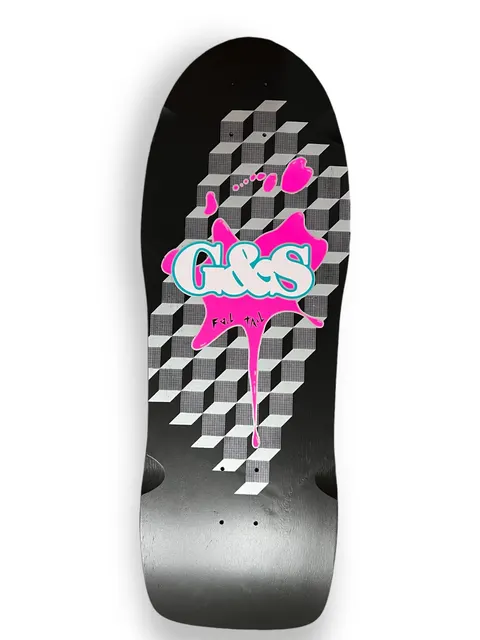 G&S FoilTail Black with Hot Pink Splat skateboard deck: A white and teal graffiti-style G&S logo on a hot pink paint splat with drips, over a field of grey isometric cubes on a black old-school shaped deck. 'Foil Tail' is written beneath the logo.