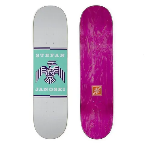 Habitat Janoski Raptor Terratone skateboard deck: A white-grey deck with a teal central panel showing a stylised purple and white striped eagle with the Habitat logo on its chest, between the name Stefan Janoski. The bottom shows a magenta wood-stained veneer.