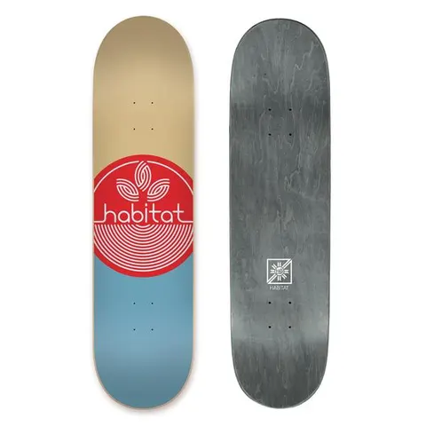 Habitat Leaf Dot Xl skateboard deck: Red circle with the white outline Habitat leaf logo and wordmark over concentric lines, across a deck split between tan above and light blue below.