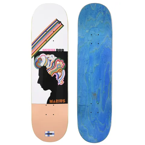 Habitat Syvanen Suomi Bob skateboard deck: Pop-art profile silhouette of a head in black with swirling multicoloured hair, under diagonal rainbow stripes, with a Finnish flag logo at the tail. Suomi Bob and Marius are written on the graphic; a blue-stained underside is also shown.