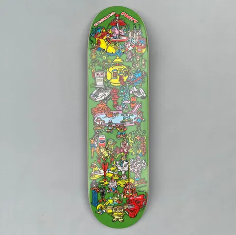 Insane Garden of Unearthly Shite skateboard deck: A crowded cartoon collage of toys, gadgets and oddities on a green background: a carousel, a teapot house, a toy train, robots, a soda can, a garden gnome, a birdcage and a red tape player, packed edge to edge.