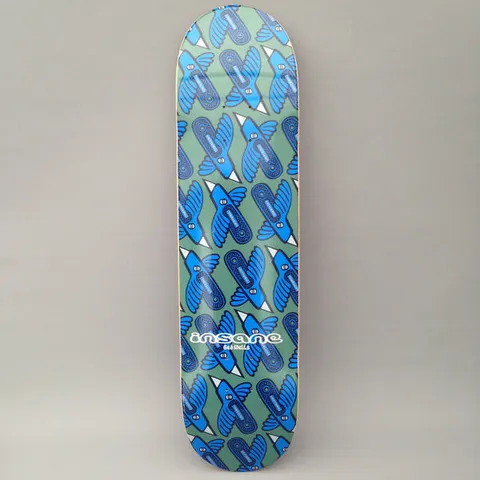 Insane Stanley Bird skateboard deck: Repeating all-over pattern of stylised blue birds, each with a skateboard-shaped body and white beak, set on a muted green background. The Insane logo and a small name sit near the tail.
