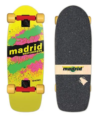 Madrid Explosion OG Cruiser Yellow skateboard deck: Small yellow cruiser shape with pink and green paint splatters and a black band carrying the Madrid Skateboards logo in yellow. Shown as a complete with red trucks and yellow wheels, plus a griptape view with a small logo strip.
