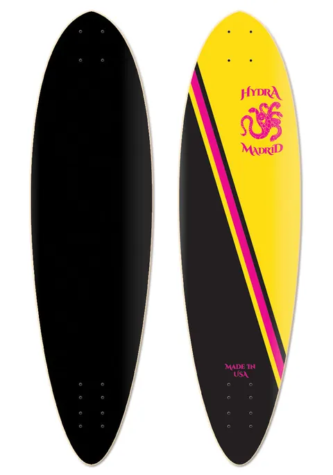 Madrid Hydra 33.5 skateboard deck: A pointed-nose longboard shape shown top and bottom: the top is yellow with a black diagonal block split by pink and black stripes, a pink octopus logo and Hydra Madrid lettering, plus Made in USA at the tail. The underside is plain black.