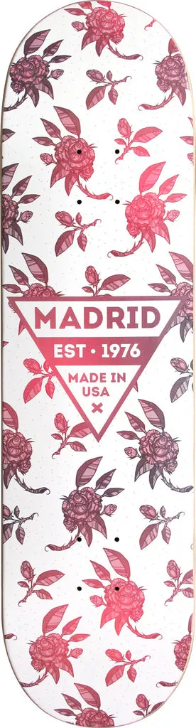 Madrid Rosa 8 skateboard deck: White deck with an all-over pattern of roses, buds and leaves in pink, red and maroon, with a triangular logo reading Madrid Est. 1976 Made in USA at the centre.
