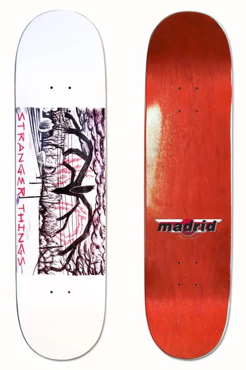 Madrid X Stranger Things - Mind Flayer 8 skateboard deck: A dark pen-style drawing of a tall spindly monster among bare trees under a stormy sky, with red cracks of light, framed on a white deck beside red vertical Stranger Things lettering. The photo also shows the red underside with a Madrid logo.