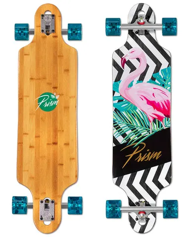 Prism Skate Co. Prism Revel 36 skateboard deck: A pink flamingo among teal palm and monstera leaves on a black and white zigzag chevron background, with a gold script logo on a black band. The bamboo underside has a green circular logo. Shown as a complete longboard.