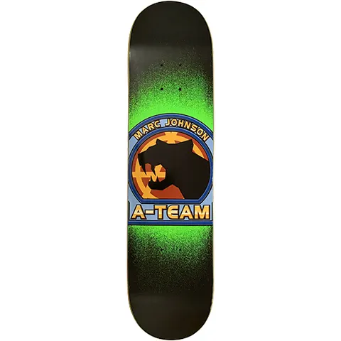 A-Team Marc Johnson Crest skateboard deck: Black deck with a green spray-fade glow behind a blue and orange circular crest. A black panther head silhouette sits in the middle, with the rider's name curved across the top and A-TEAM in a banner below.