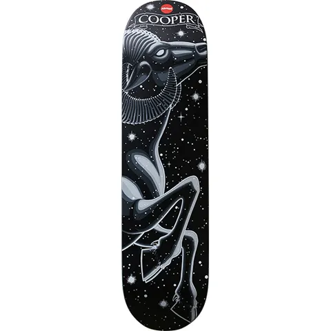 Almost Cooper Wilt Zodiac Series skateboard deck: Black deck of a night sky with scattered stars and a grey, white-lined ram with large curled horns rearing up on its hind legs, for the Aries zodiac sign. 'Cooper' on a banner at the top.