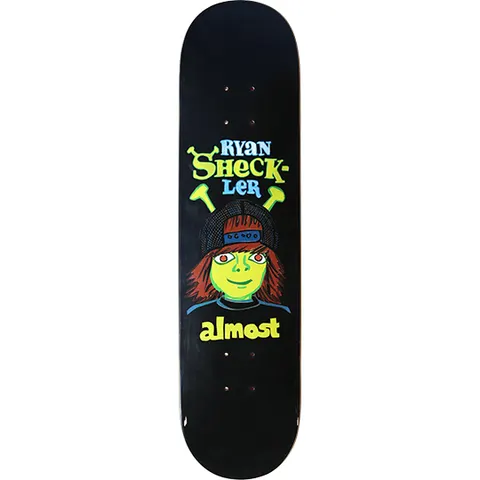 Almost Ryan Sheckler skateboard deck: Cartoon of a green-faced kid in a backwards red-brown cap and long hair with green antenna-like ears, resembling an ogre, above almost lettering, with RYAN SHECK-LER in colourful type on black.