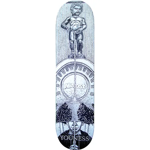 Almost Youness Amrani Manneken Pis skateboard deck: Monochrome engraving-style artwork of the Manneken Pis statue on a pedestal, its stream running down through a round Almost emblem to a figure beneath two spotted umbrellas. Fine line-hatched background.