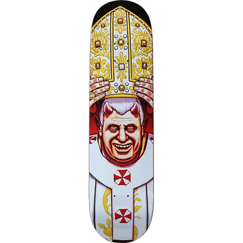 Blind Devil Pope skateboard deck: A grinning papal figure with red devil horns and wide eyes, hands gripping a tall gold and white ornate mitre. White vestments carry red and white umbrella-style emblems on a white deck.