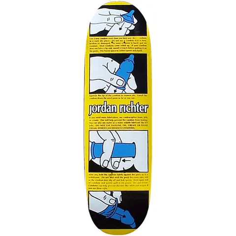 Blind Jordan Richter Safety Gear skateboard deck: Four-panel safety instruction diagram on a yellow ground showing hands unrolling a blue condom, with small printed usage instructions between the panels and the rider's name in white lettering across the middle.