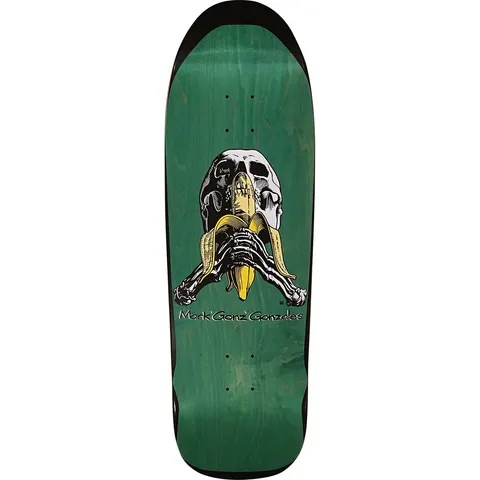 Blind Mark Gonzales Skull And Banana Reissue skateboard deck: A skull with a peeled banana held across its mouth by skeletal hands, drawn in a detailed engraving style, with 'Mark "Gonz" Gonzales' lettered below, on a green-stained old-school shape with a black edge.